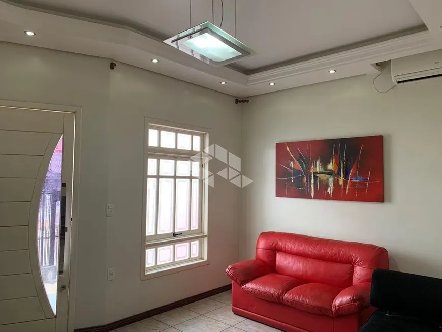 Foto 1 de Casa com 3 Quartos à venda, 150m² em Vila Monte Carlo, Cachoeirinha