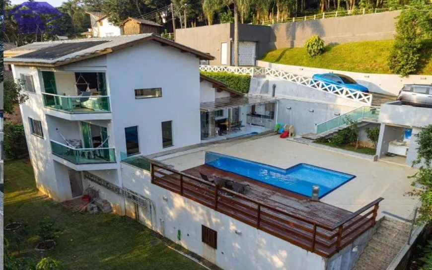 Foto 1 de Casa com 4 Quartos à venda, 300m² em Cumbari, Mairiporã