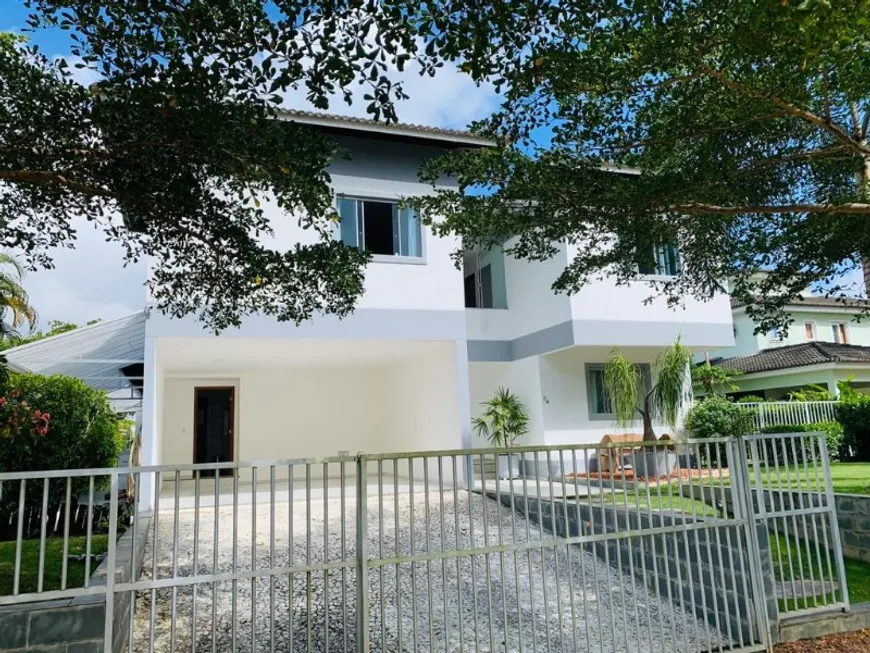 Foto 1 de Casa de Condomínio com 4 Quartos à venda, 425m² em Busca-Vida, Camaçari