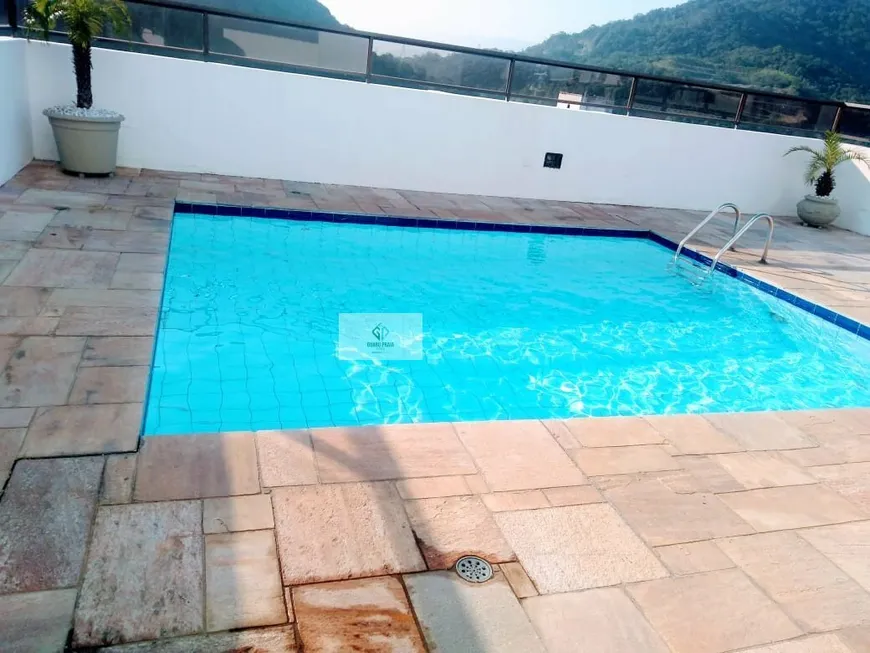 Foto 1 de Apartamento com 4 Quartos à venda, 115m² em Pitangueiras, Guarujá