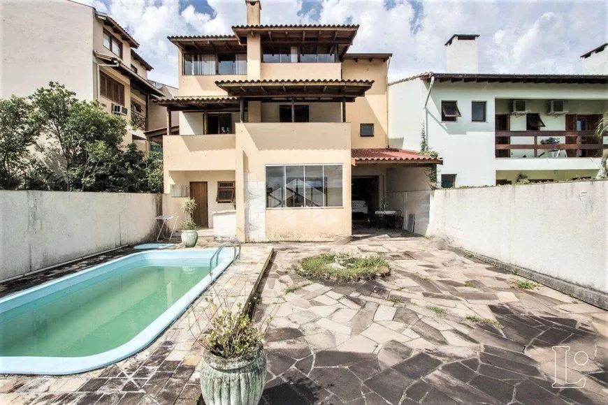 Foto 1 de Casa com 4 Quartos à venda, 299m² em Aberta dos Morros, Porto Alegre
