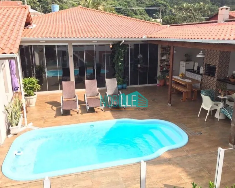 Foto 1 de Casa com 9 Quartos à venda, 700m² em Canasvieiras, Florianópolis