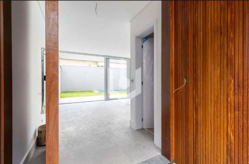 Foto 1 de Casa de Condomínio com 4 Quartos à venda, 450m² em Santo Amaro, São Paulo