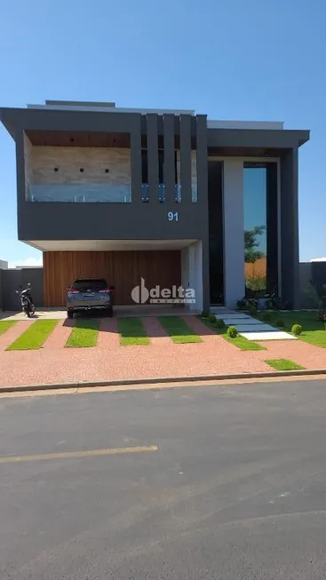 Foto 1 de Casa de Condomínio com 4 Quartos à venda, 375m² em Granja Marileusa , Uberlândia