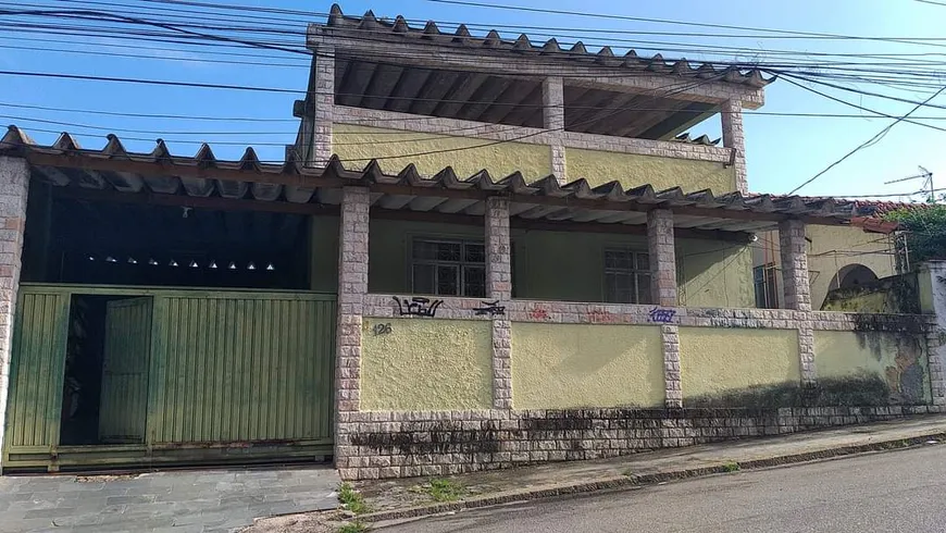 Foto 1 de Casa com 4 Quartos à venda, 303m² em Tomás Coelho, Rio de Janeiro