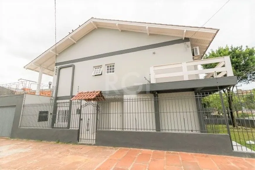 Foto 1 de Casa com 4 Quartos à venda, 237m² em Nonoai, Porto Alegre