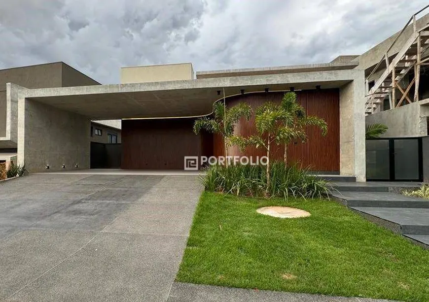 Foto 1 de Casa de Condomínio com 4 Quartos à venda, 369m² em Jardins Italia, Goiânia