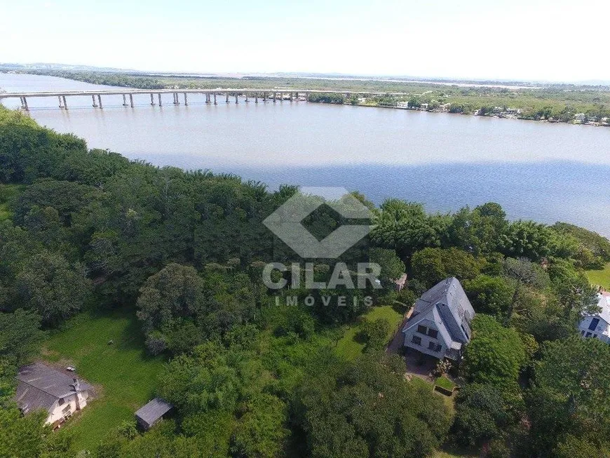 Foto 1 de Casa com 5 Quartos à venda, 350m² em Arquipélago, Porto Alegre