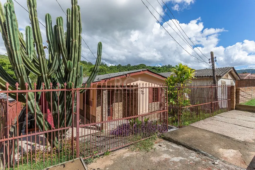 Foto 1 de Casa com 2 Quartos à venda, 84m² em Agronomia, Porto Alegre