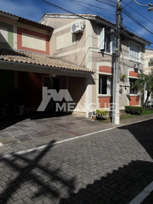 Foto 1 de Casa de Condomínio com 4 Quartos à venda, 85m² em Humaitá, Porto Alegre