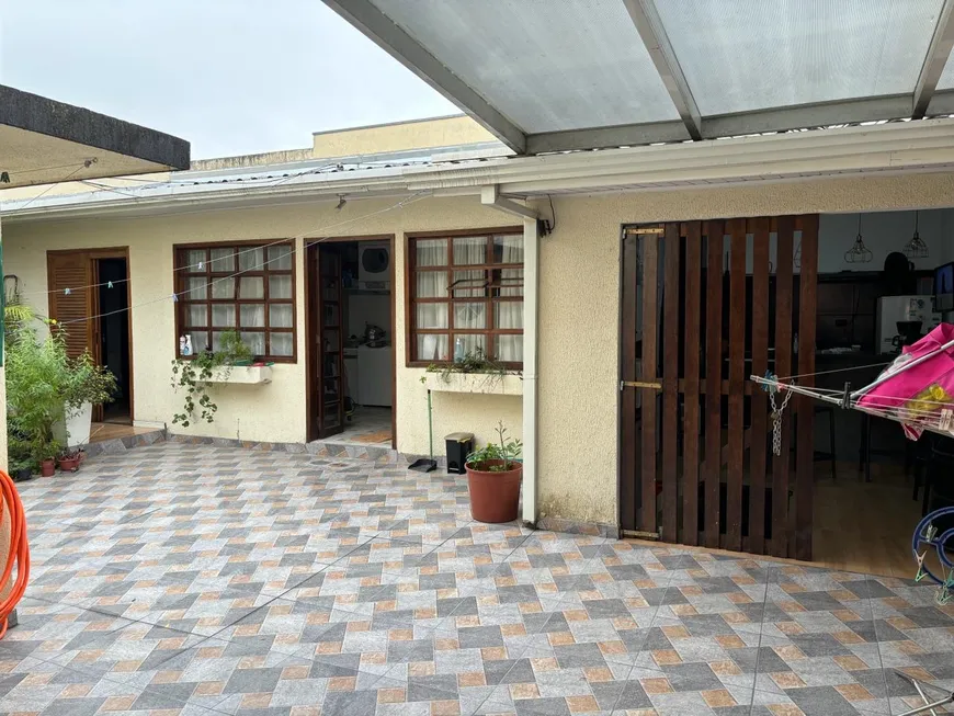 Foto 1 de Casa com 4 Quartos à venda, 260m² em Bacacheri, Curitiba