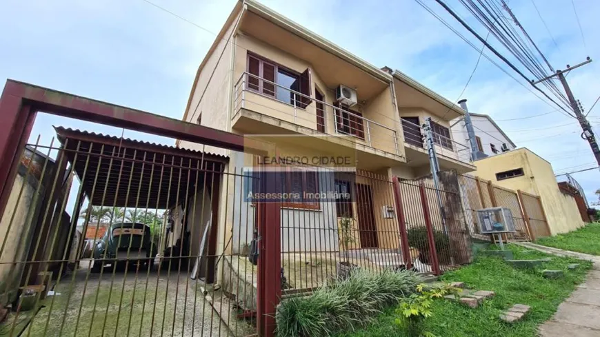 Foto 1 de Casa com 3 Quartos à venda, 100m² em Jardim Krahe, Viamão