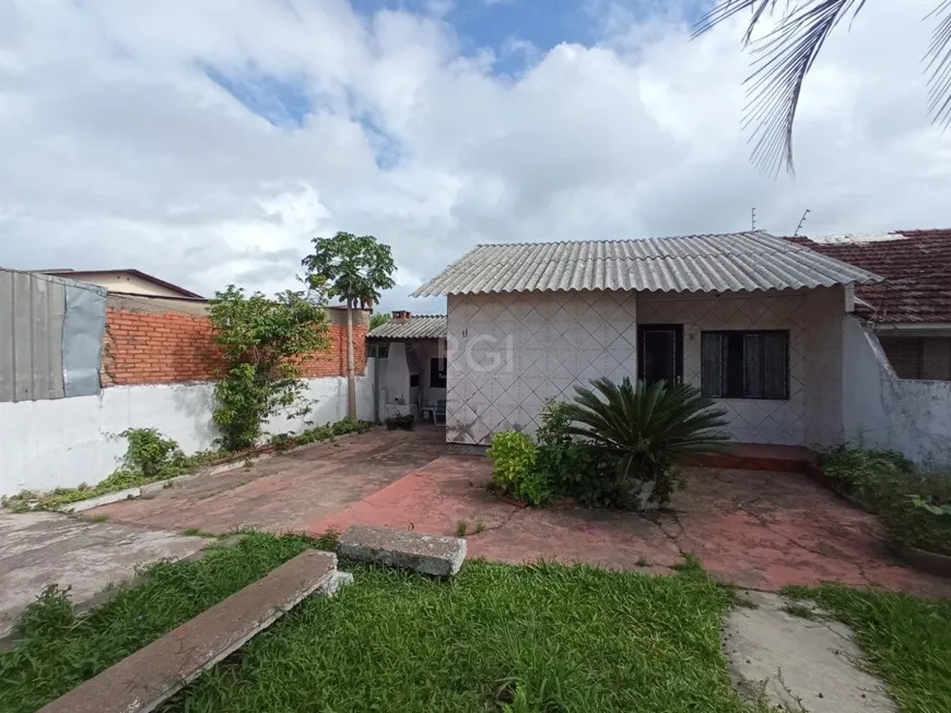 Foto 1 de Casa com 4 Quartos à venda, 84m² em Restinga, Porto Alegre