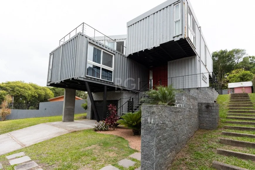 Foto 1 de Casa com 3 Quartos à venda, 334m² em Teresópolis, Porto Alegre