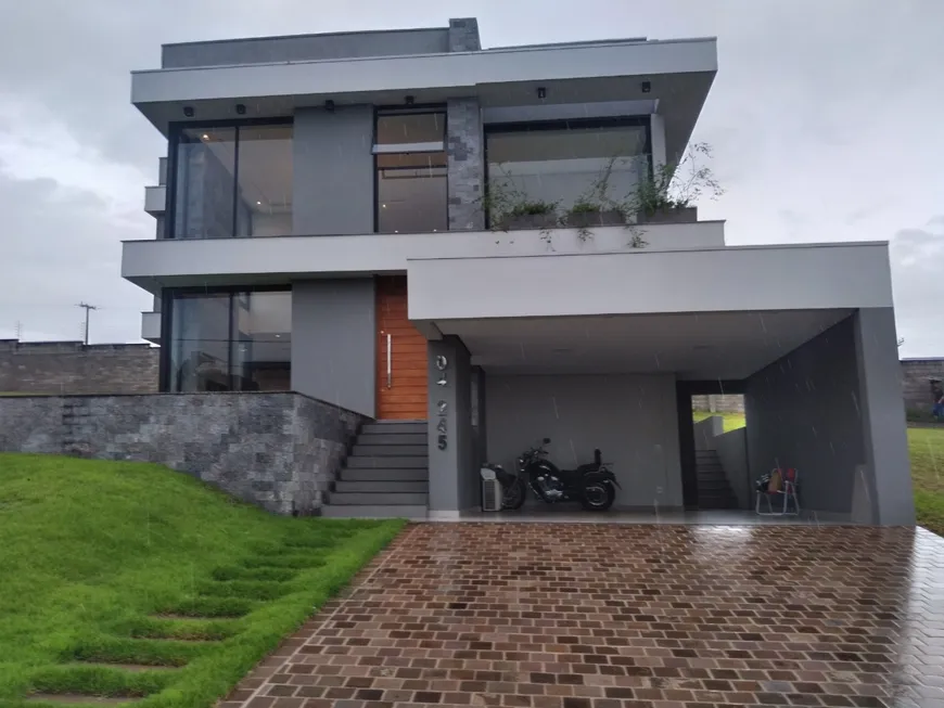 Foto 1 de Casa de Condomínio com 4 Quartos à venda, 267m² em Encosta do Sol, Estância Velha