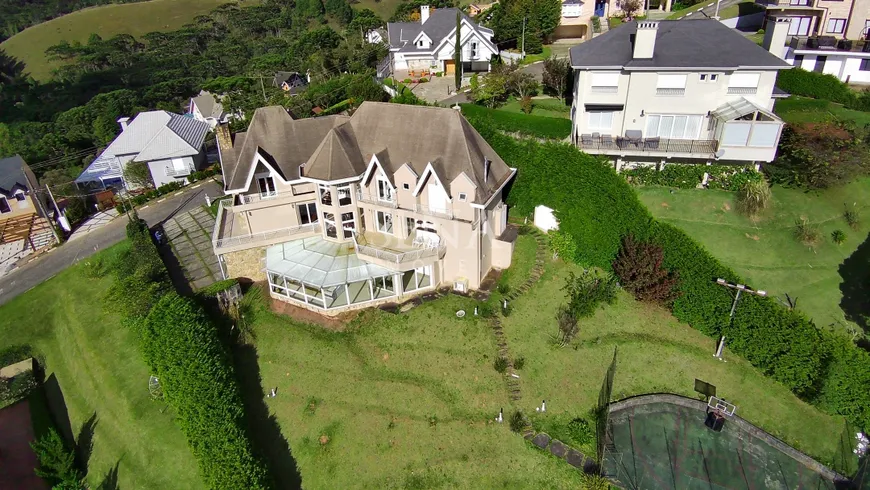 Foto 1 de Casa de Condomínio com 4 Quartos para venda ou aluguel, 600m² em Descansopolis, Campos do Jordão