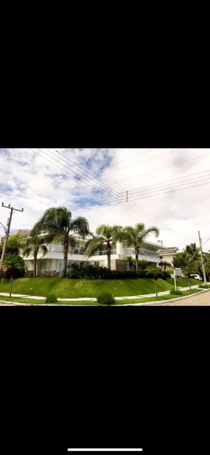 Foto 1 de Casa com 4 Quartos para venda ou aluguel, 600m² em Jurerê Internacional, Florianópolis