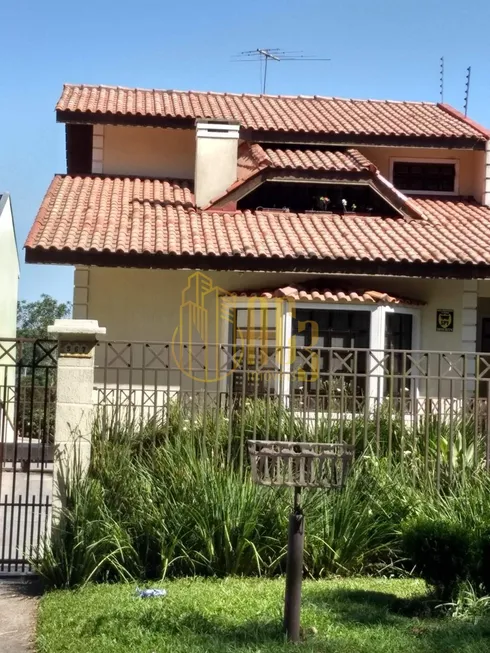 Foto 1 de Casa com 4 Quartos à venda, 250m² em Tarumã, Curitiba