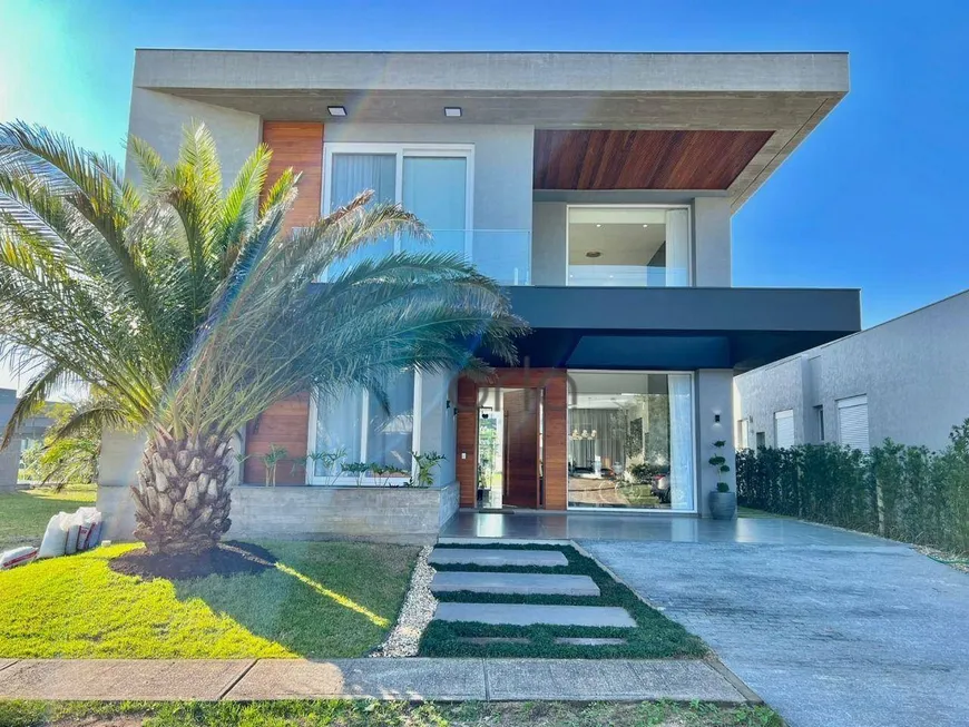 Foto 1 de Casa de Condomínio com 4 Quartos à venda, 280m² em Condominio Capao Ilhas Resort, Capão da Canoa