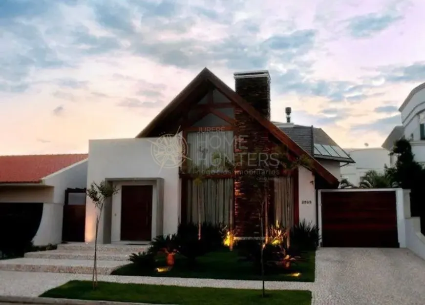 Foto 1 de Casa com 3 Quartos para alugar, 262m² em Jurerê Internacional, Florianópolis