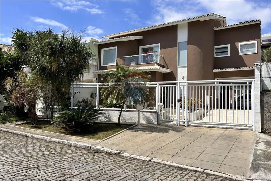 Foto 1 de Casa com 4 Quartos à venda, 304m² em Jardim Carioca, Rio de Janeiro