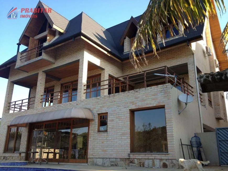 Foto 1 de Casa de Condomínio com 5 Quartos à venda, 663m² em Alphaville, Santana de Parnaíba