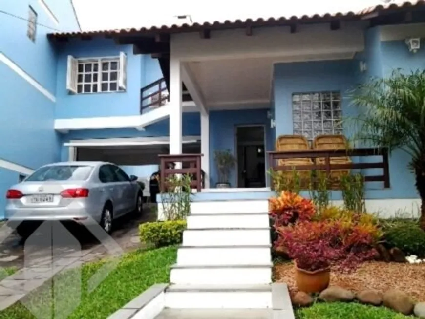 Foto 1 de Casa com 5 Quartos à venda, 215m² em Ipanema, Porto Alegre