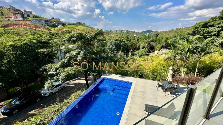 Foto 1 de Casa com 4 Quartos à venda, 430m² em Vila  Alpina, Nova Lima