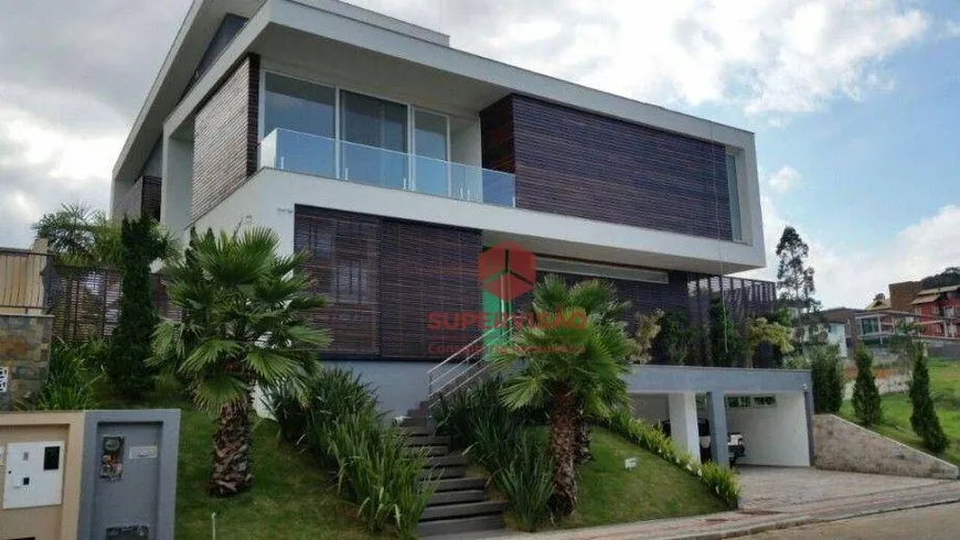 Foto 1 de Casa de Condomínio com 4 Quartos à venda, 488m² em Cacupé, Florianópolis