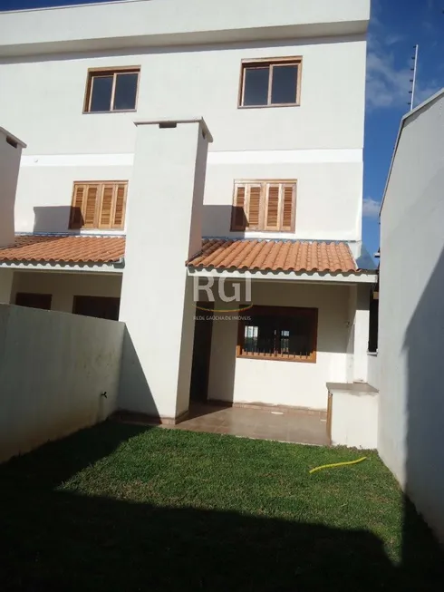 Foto 1 de Casa com 2 Quartos à venda, 152m² em Santa Fé, Porto Alegre
