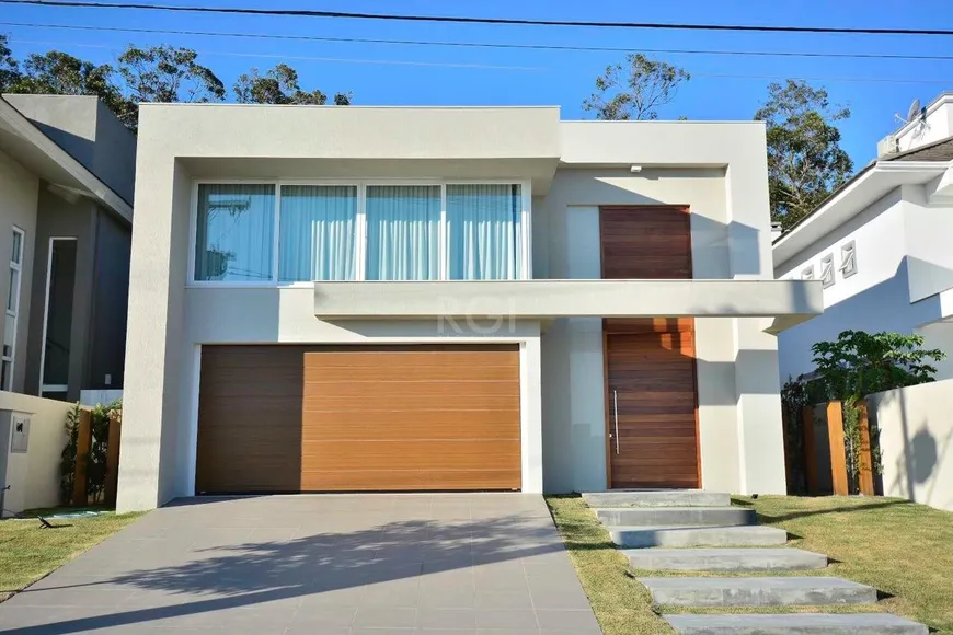 Foto 1 de Casa de Condomínio com 5 Quartos à venda, 401m² em Alphaville, Porto Alegre