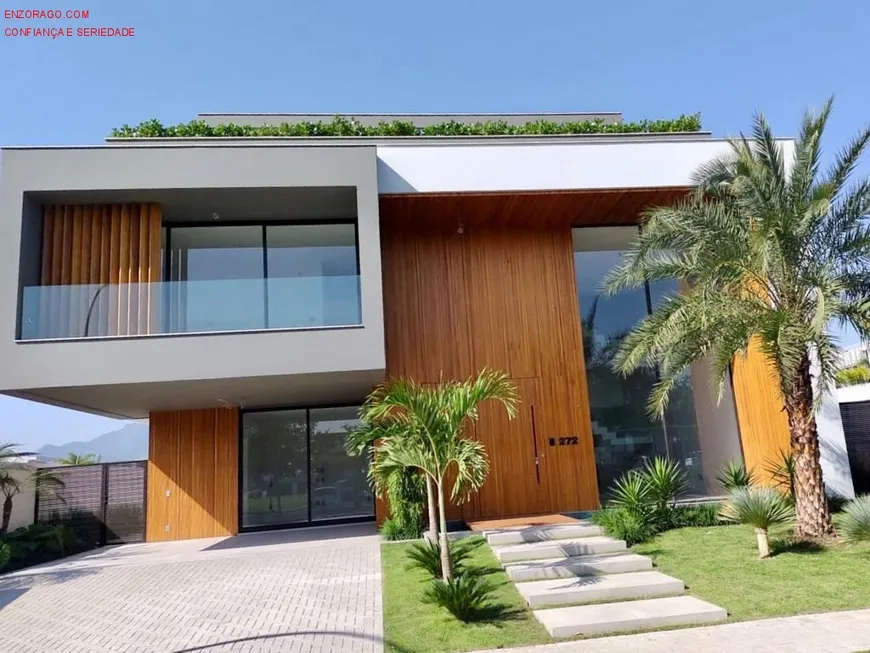 Foto 1 de Casa de Condomínio com 5 Quartos à venda, 900m² em Barra da Tijuca, Rio de Janeiro