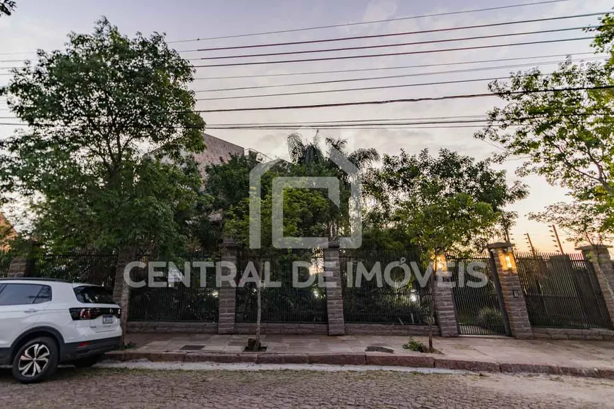 Foto 1 de Casa com 3 Quartos à venda, 941m² em Tristeza, Porto Alegre