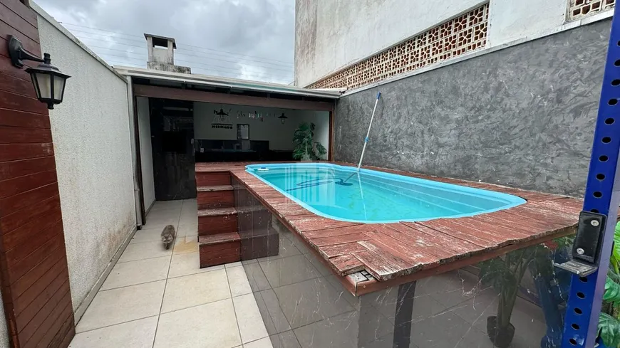 Foto 1 de Sobrado com 2 Quartos à venda, 82m² em Centro, Camboriú