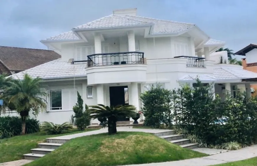 Foto 1 de Casa com 4 Quartos para venda ou aluguel, 300m² em Jurerê Internacional, Florianópolis