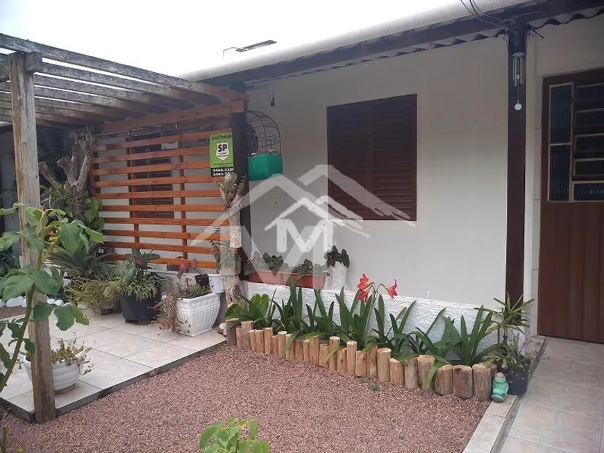 Foto 1 de Casa com 4 Quartos à venda, 180m² em Guajuviras, Canoas