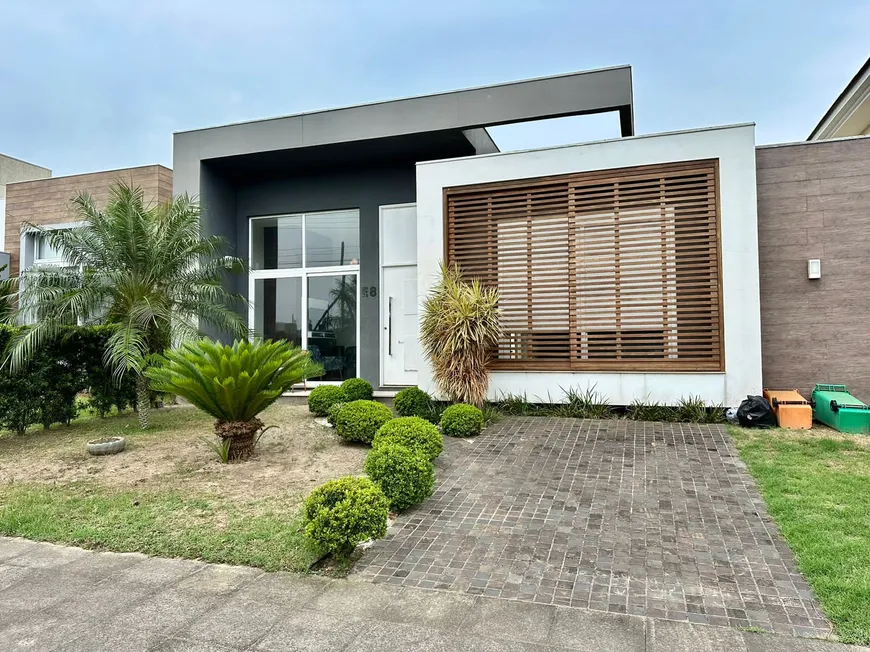Foto 1 de Casa de Condomínio com 3 Quartos à venda, 190m² em Condado de Capão, Capão da Canoa