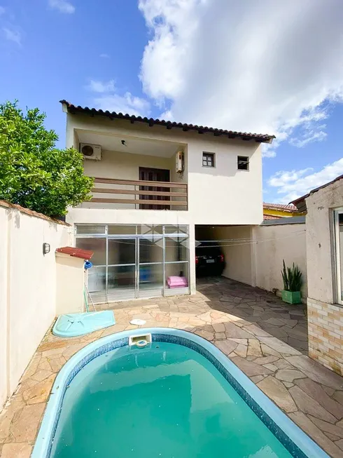 Foto 1 de Casa com 3 Quartos à venda, 250m² em Jardim Algarve, Alvorada