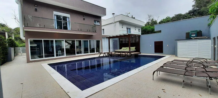 Foto 1 de Casa de Condomínio com 5 Quartos à venda, 450m² em Riviera de São Lourenço, Bertioga