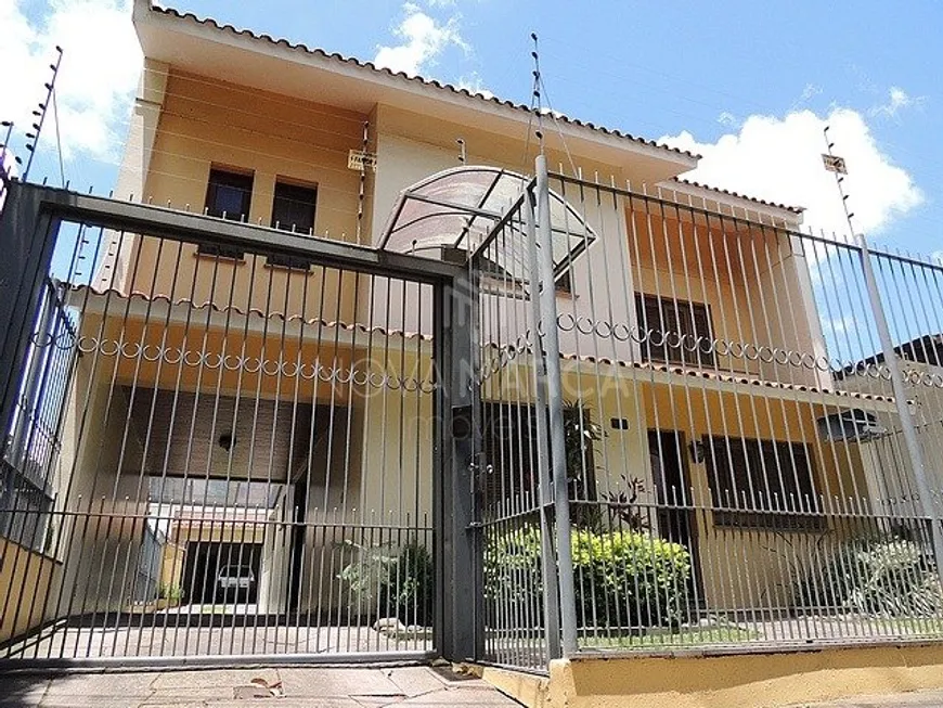 Foto 1 de Casa com 4 Quartos à venda, 302m² em Vila Ipiranga, Porto Alegre