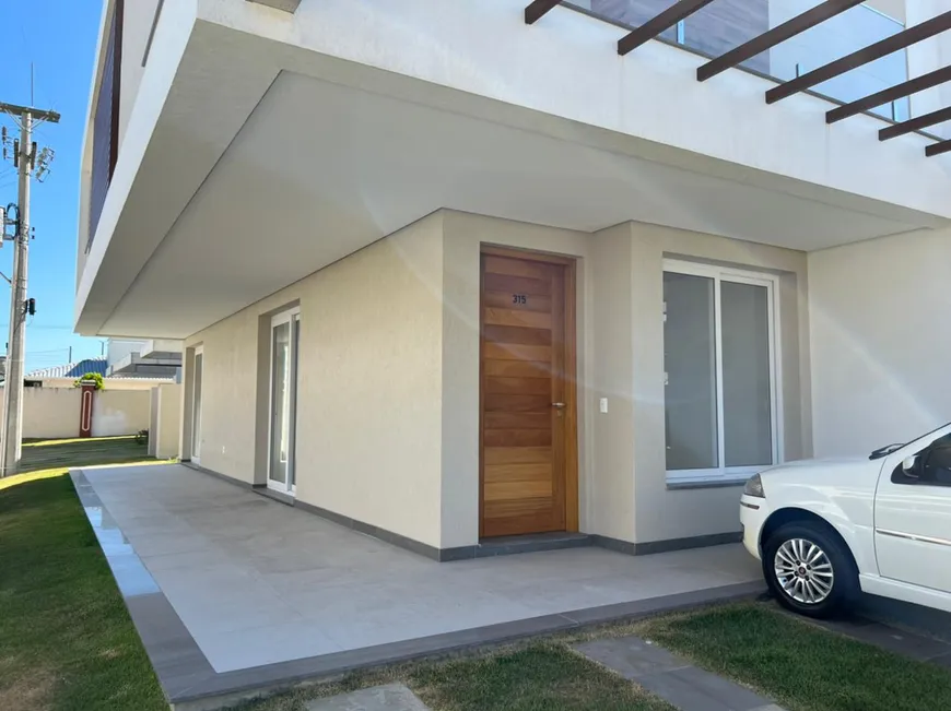 Foto 1 de Casa de Condomínio com 3 Quartos à venda, 150m² em Zona Nova, Capão da Canoa