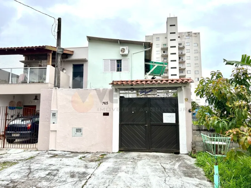 Foto 1 de Casa com 2 Quartos à venda, 106m² em Jardim Aruã, Caraguatatuba