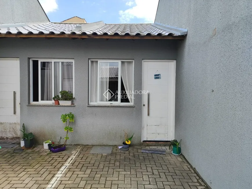 Foto 1 de Casa de Condomínio com 2 Quartos à venda, 54m² em Jardim Iolanda, Guaíba