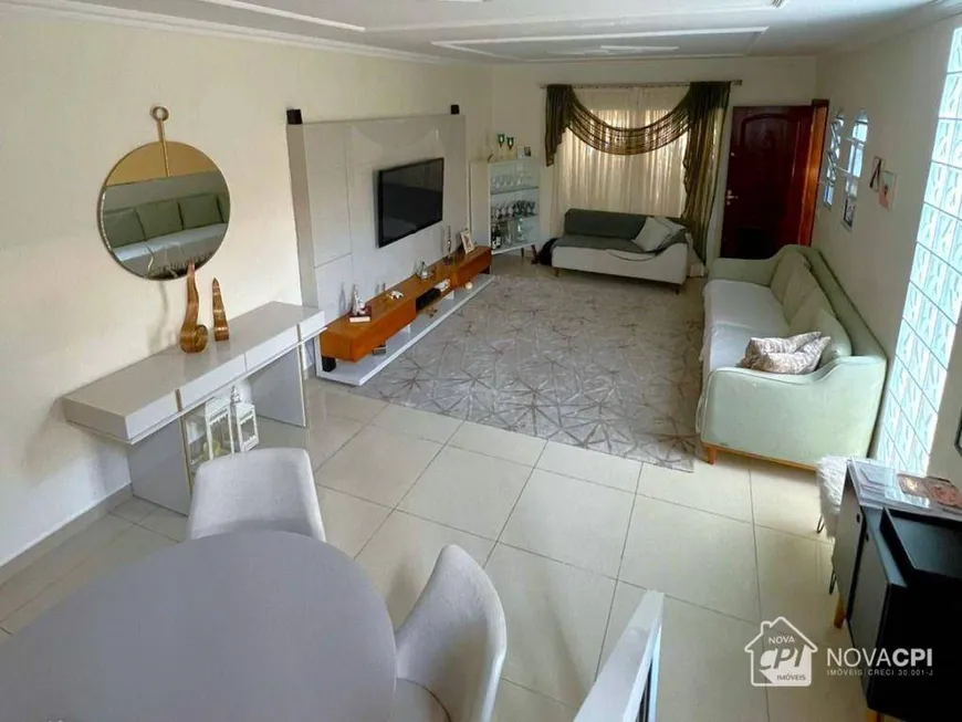 Foto 1 de Sobrado com 3 Quartos à venda, 130m² em Vila Tupi, Praia Grande