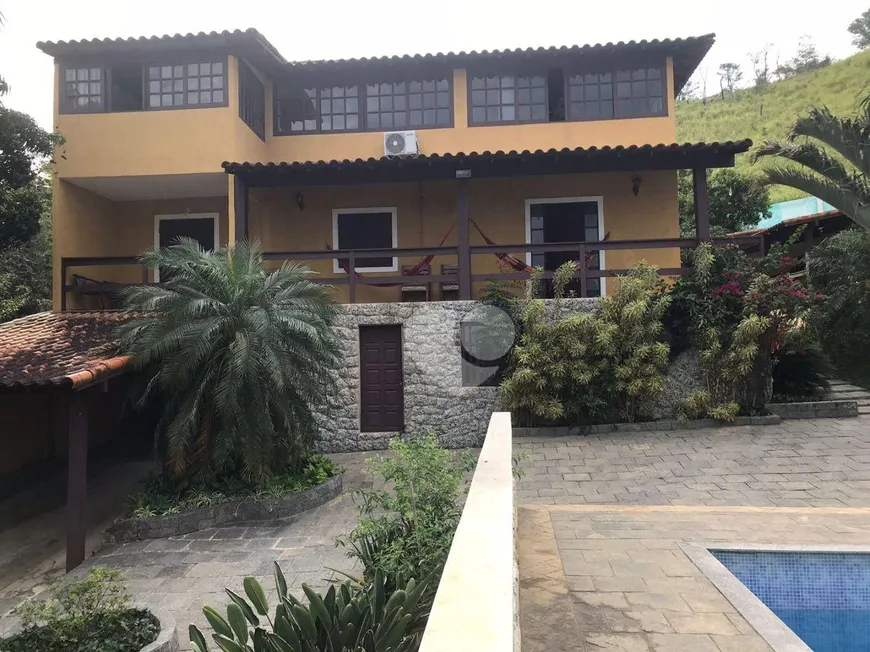 Foto 1 de Casa com 7 Quartos à venda, 404m² em Parque Tamariz, Iguaba Grande