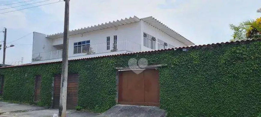 Foto 1 de Casa com 5 Quartos à venda, 551m² em Praça Seca, Rio de Janeiro