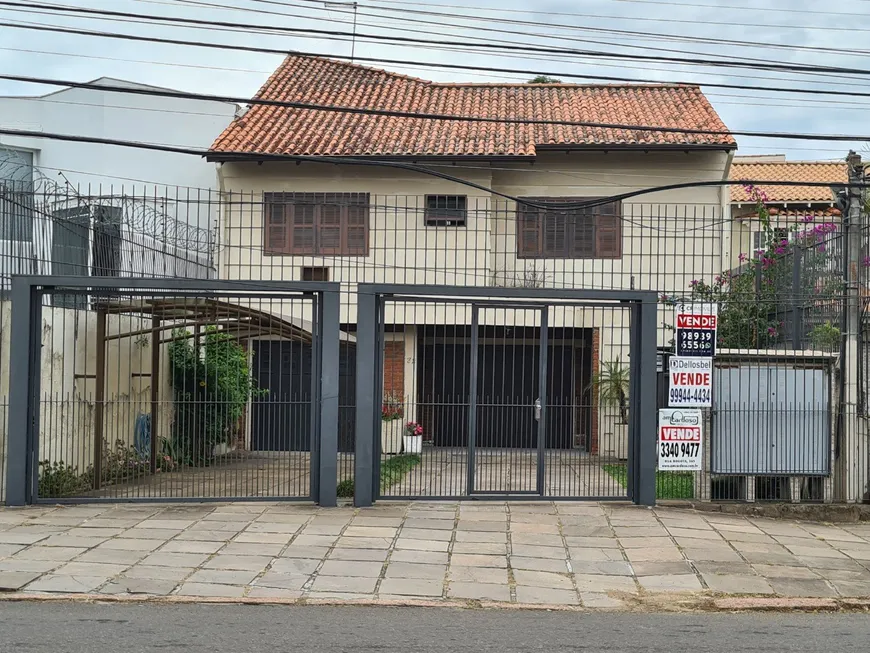 Foto 1 de Casa com 6 Quartos à venda, 410m² em Jardim São Pedro, Porto Alegre