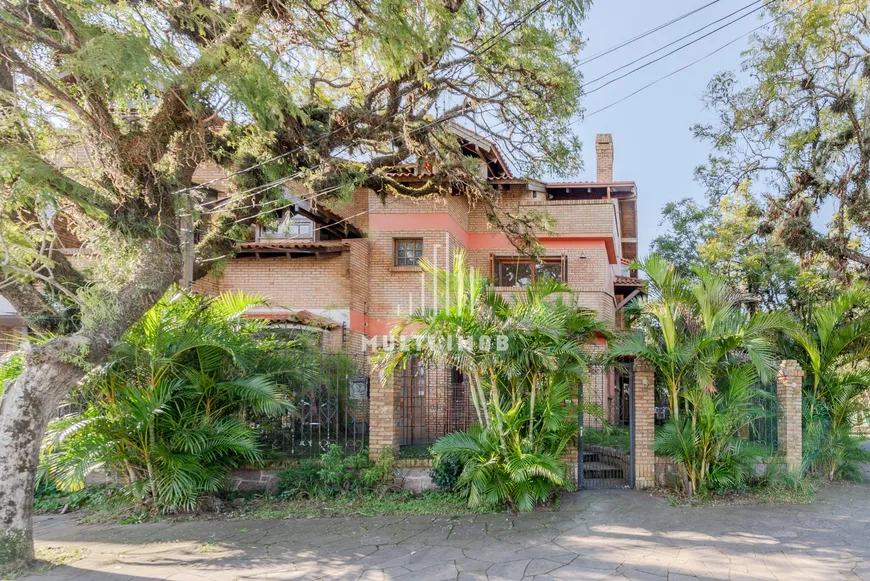 Foto 1 de Casa com 4 Quartos para venda ou aluguel, 265m² em Ipanema, Porto Alegre