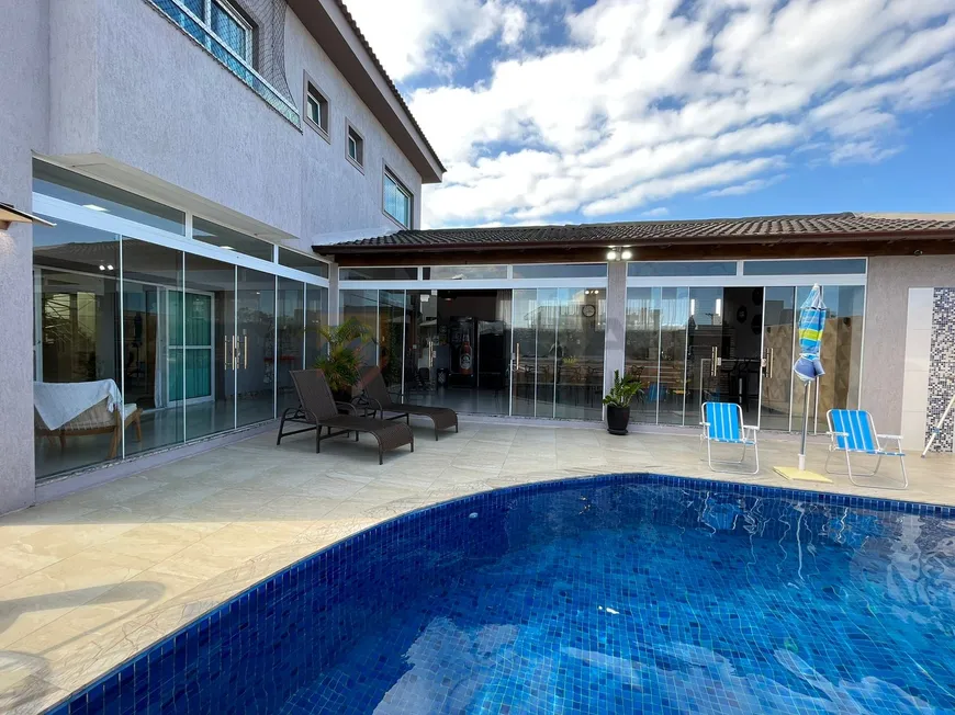 Foto 1 de Casa de Condomínio com 4 Quartos à venda, 420m² em Boulevard Lagoa, Serra