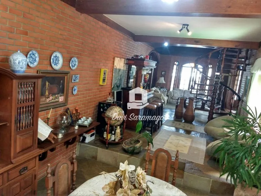 Foto 1 de Casa com 4 Quartos à venda, 450m² em Camboinhas, Niterói
